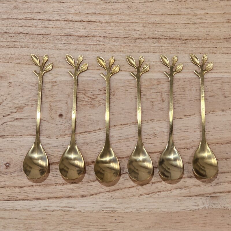 Cuchara acero dorado hojitas x6